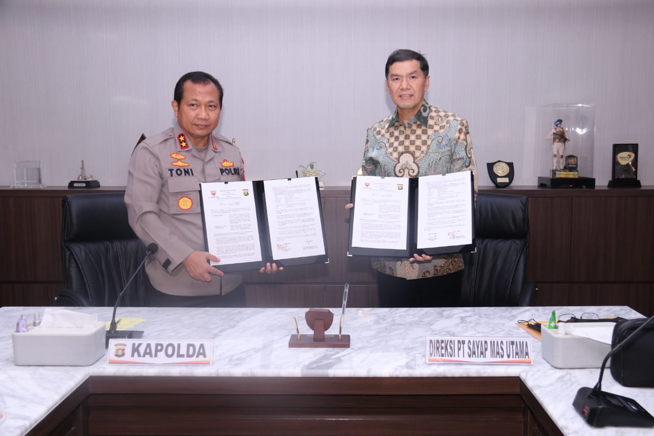 Kepolisian Daerah (Polda) Sumsel melakukan penandatanganan MoU dengan PT Wings Food dalam rangka himbah videotron di ruang Delegasi di Mapolda Sumsel