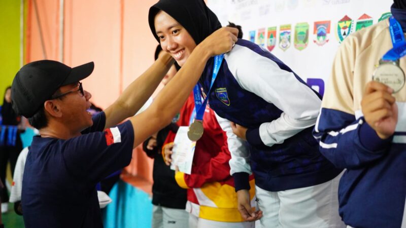 Echa Febriyana ,Putri Pertama Kades Taraman Jaya Boyong Medali Emas dari Cabor Taekwondo 2023 