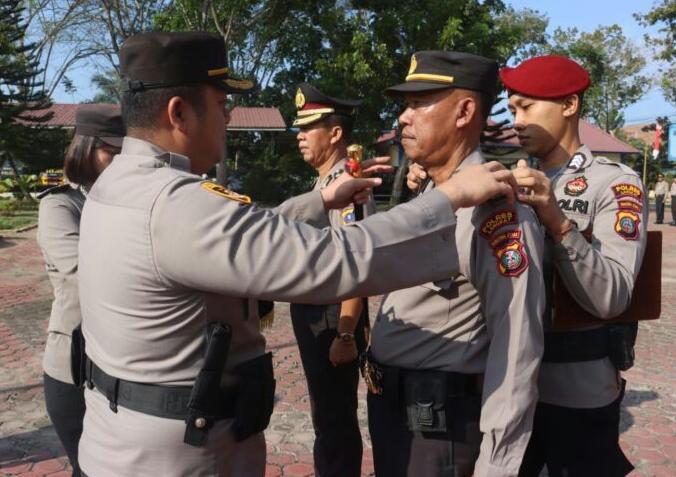 Polres Langkat Lasanakan Giat Upacara Kenaikan Pangkat