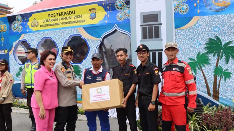 Kunjungan dan Pemberian Bantuan Kapolrestabes Medan kepada Pos Pam Ketupat Toba 2024