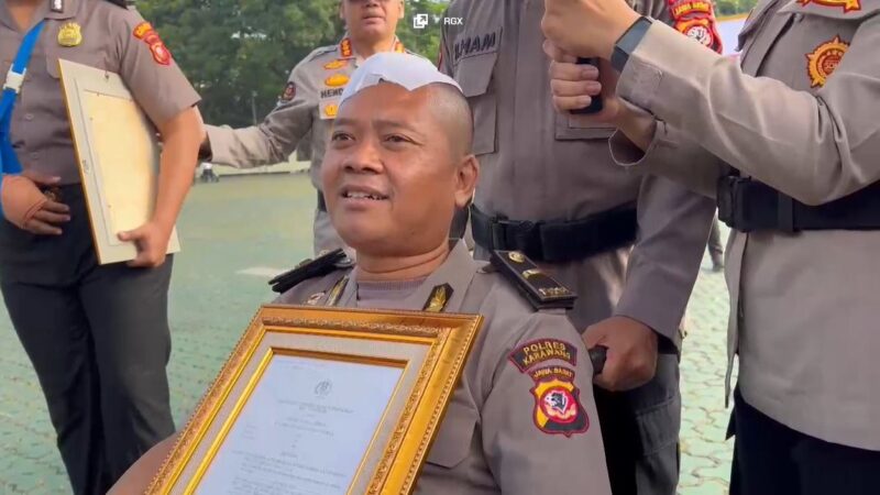 Ipda Sandy Tatiady Koswara,Terima Kenaikan Pangkat Luar Biasa Setelah Operasi Tempurung Kepala Karena Amankan Aksi Unjuk Rasa
