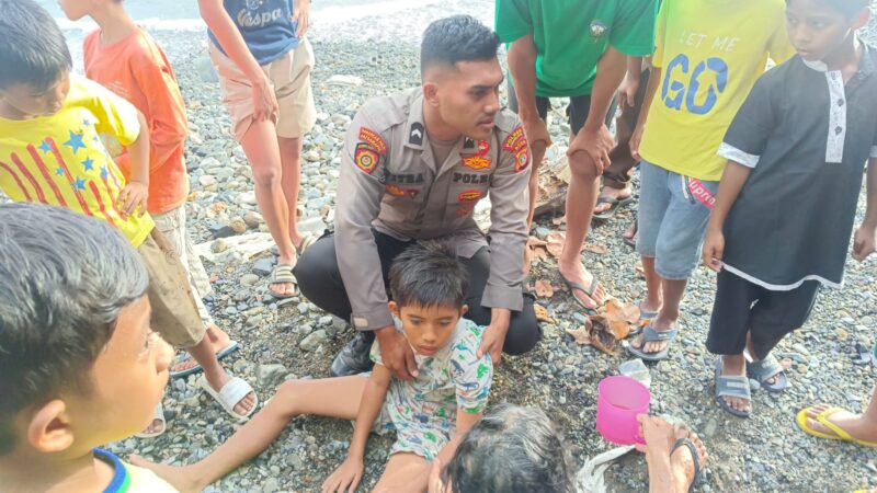 Aksi Cepat Personel Polres Aceh Selatan Selamatkan Anak Tenggelam di Laut Tapaktuan